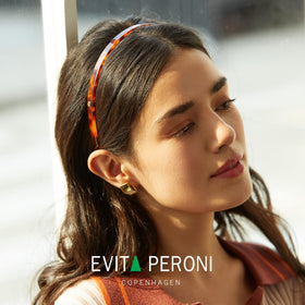 EVITA PERONI lifestyle image worn outdoors, provides stylish everyday non-slip wear