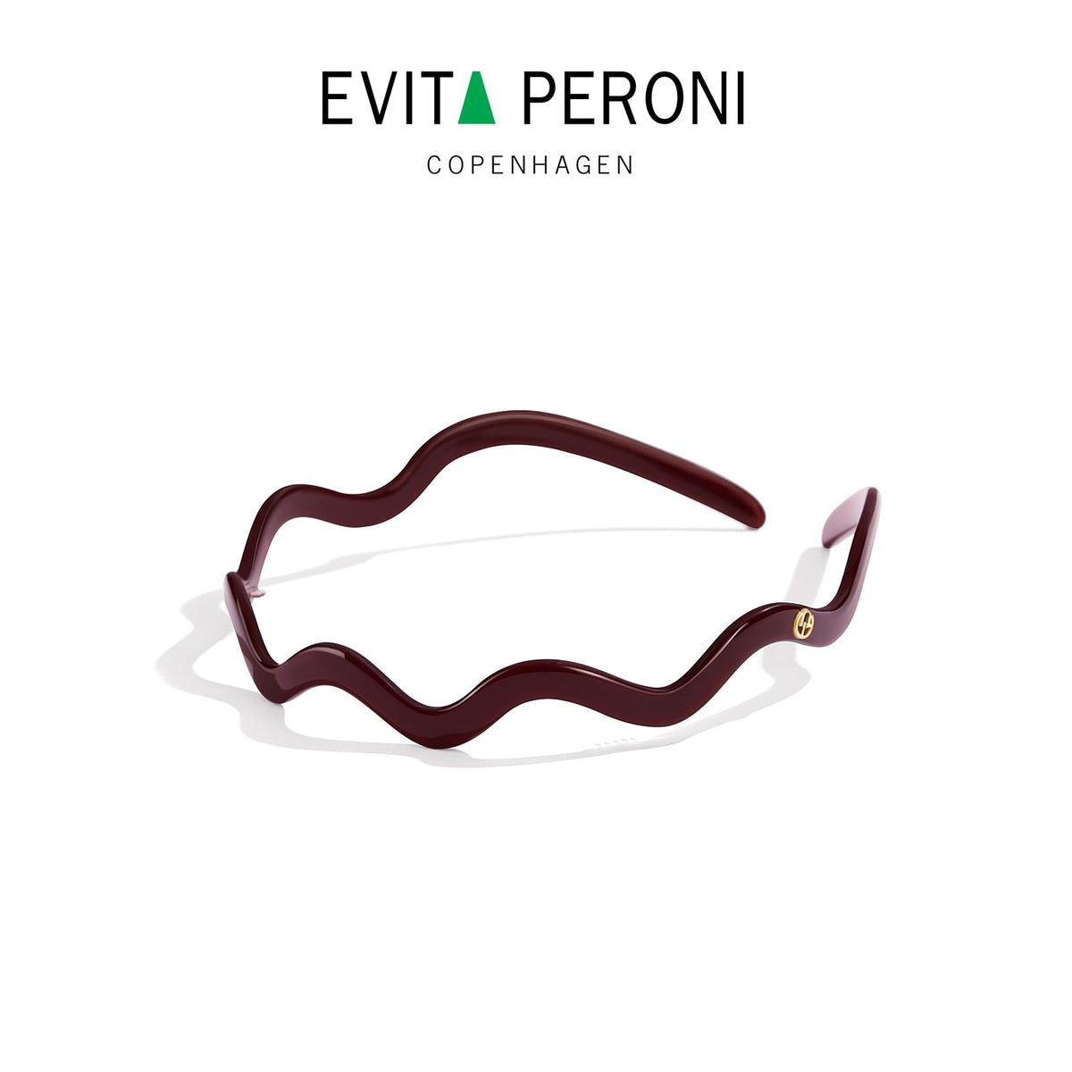 EVITA PERONI lifestyle image of woman wearing headband for all-day comfort