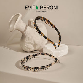 EVITA PERONI protective tube case storing headband safely for travel