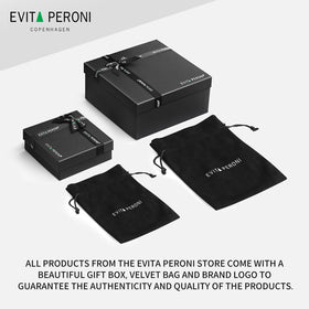 EVITA PERONI side profile worn with updo showing secure hold and classic style