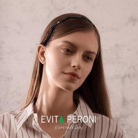 EVITA PERONI side wave profile close-up showing temple channel for glasses comfort