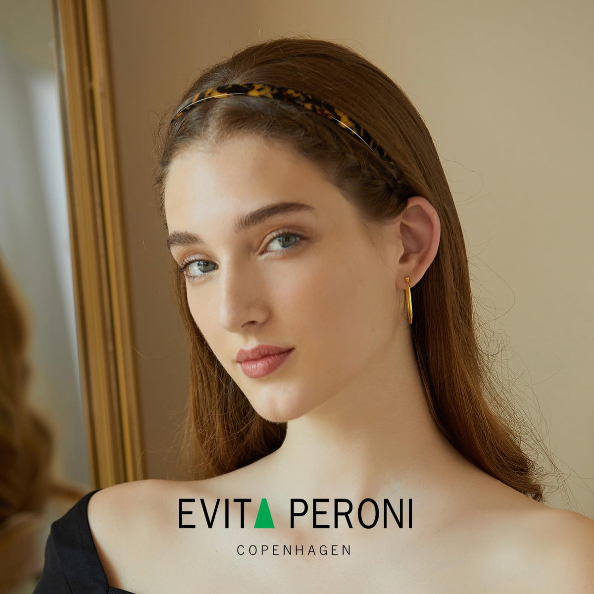EVITA PERONI close-up of acetate texture highlighting glossy durable finish