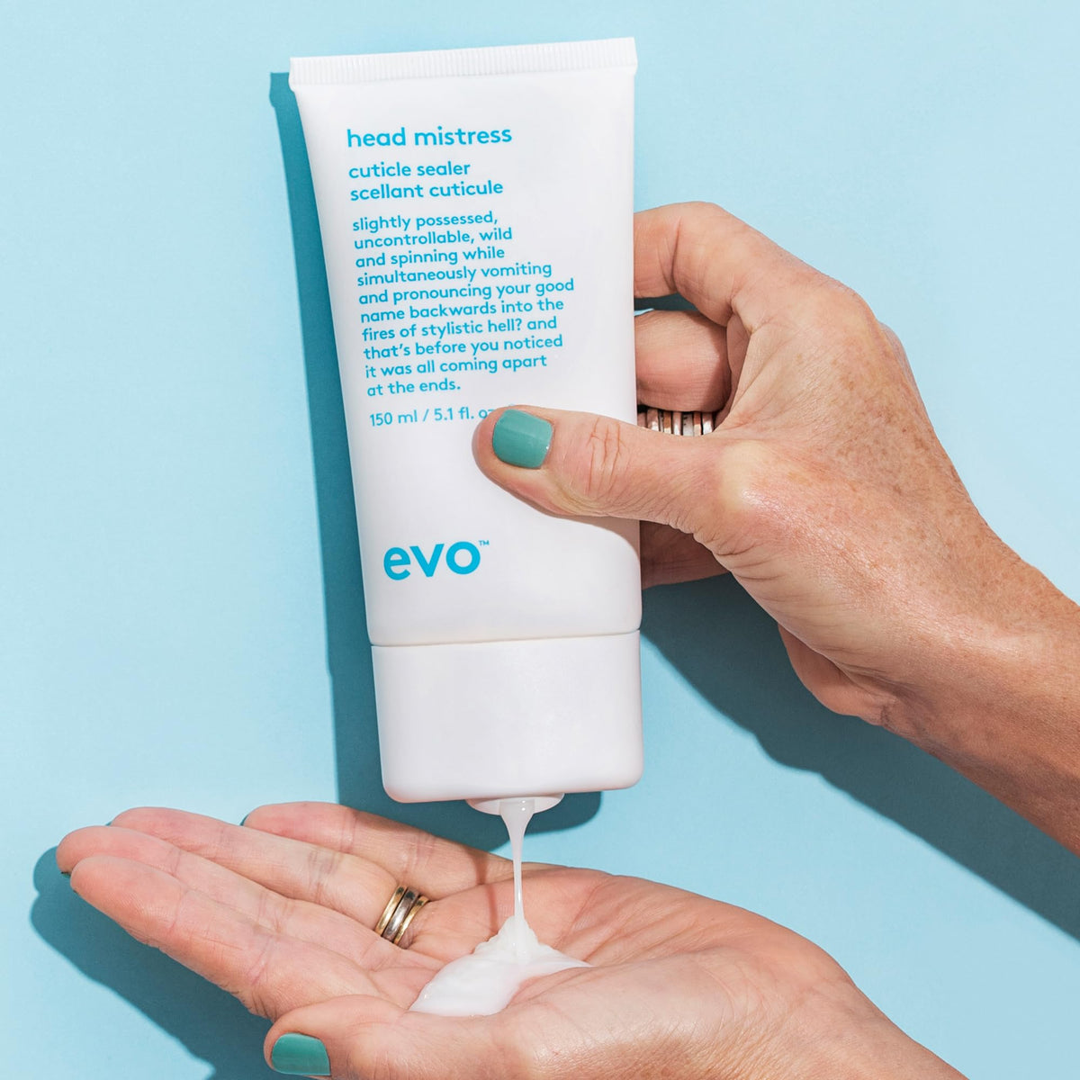 EVO Head Mistress cream texture close-up highlighting smooth slip for detangling