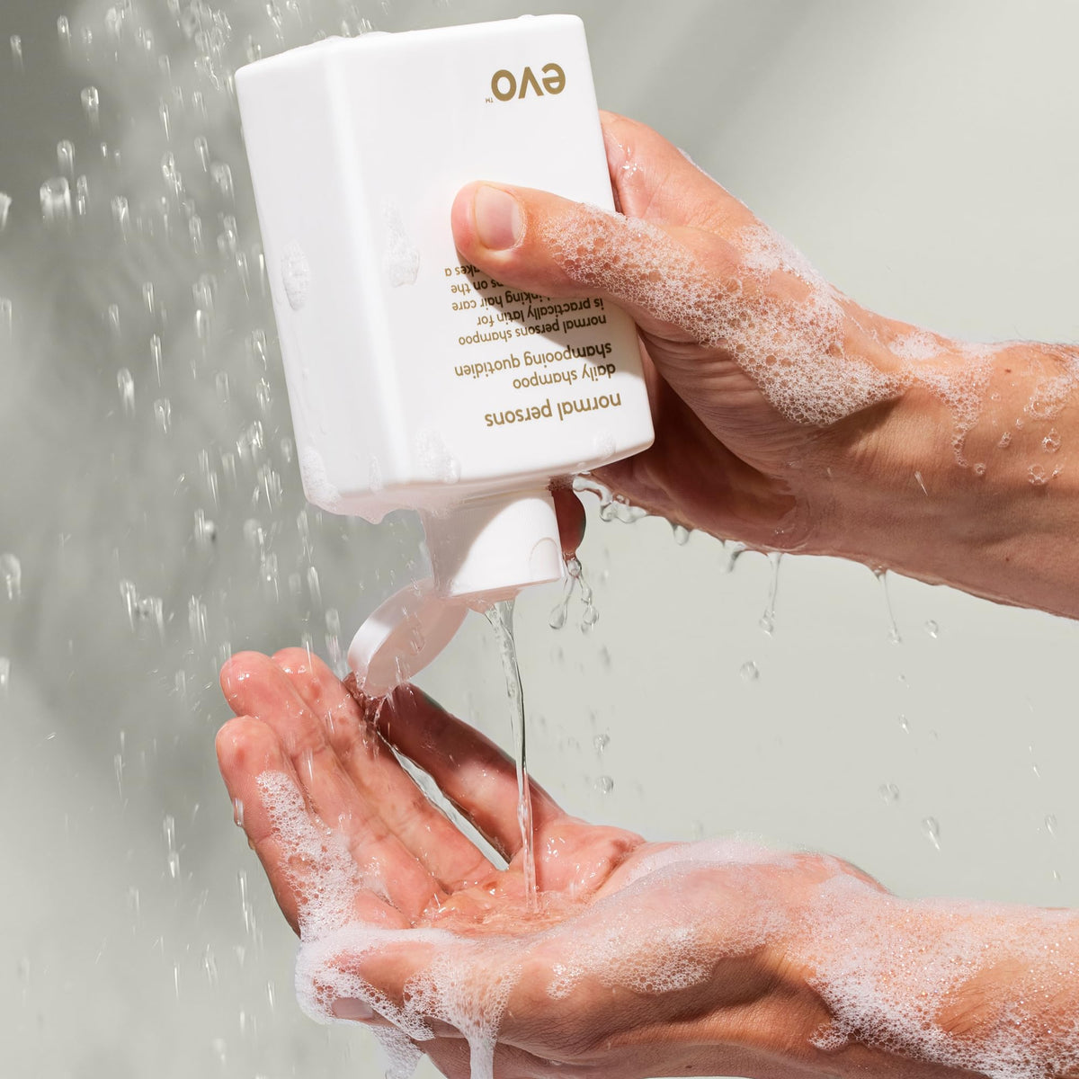 EVO lather texture close-up demonstrating rich foam that removes buildup