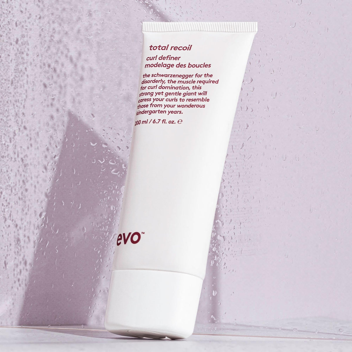 EVO in-use scrunching curls with product, defines pattern and reduces frizz