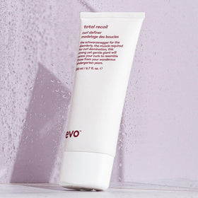 EVO in-use scrunching curls with product, defines pattern and reduces frizz