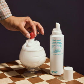 EVO applying mousse at roots for lift and long-lasting volume