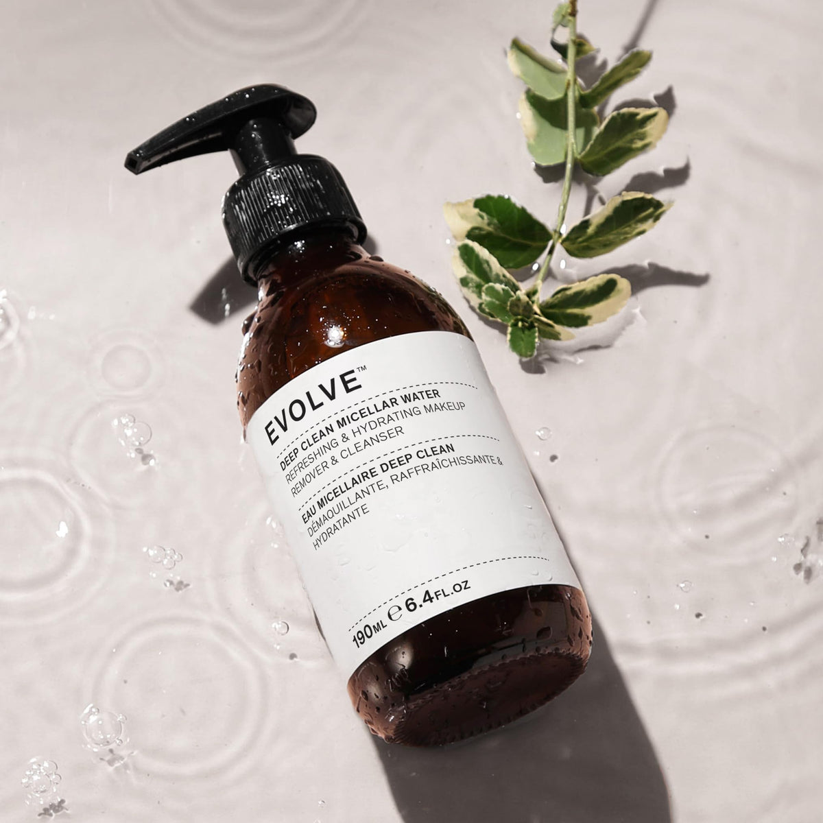 Evolve Organic Beauty removing makeup from skin with cotton pad for gentle cleansing