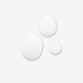 Evolve Organic Beauty micellar water texture on hand displaying lightweight hydration
