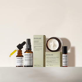 Evolve Organic Beauty on bathroom shelf conveying daily routine integration benefit