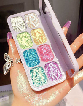 evpct palette front open showing eight iridescent pans and compact design benefit wearable glow