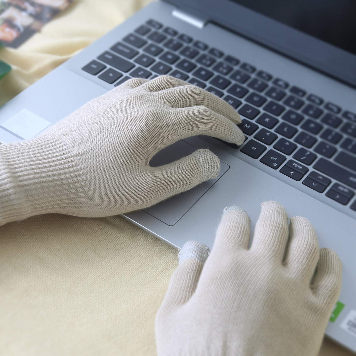 Evridwear gloves worn overnight on bedside table demonstrating protective therapy