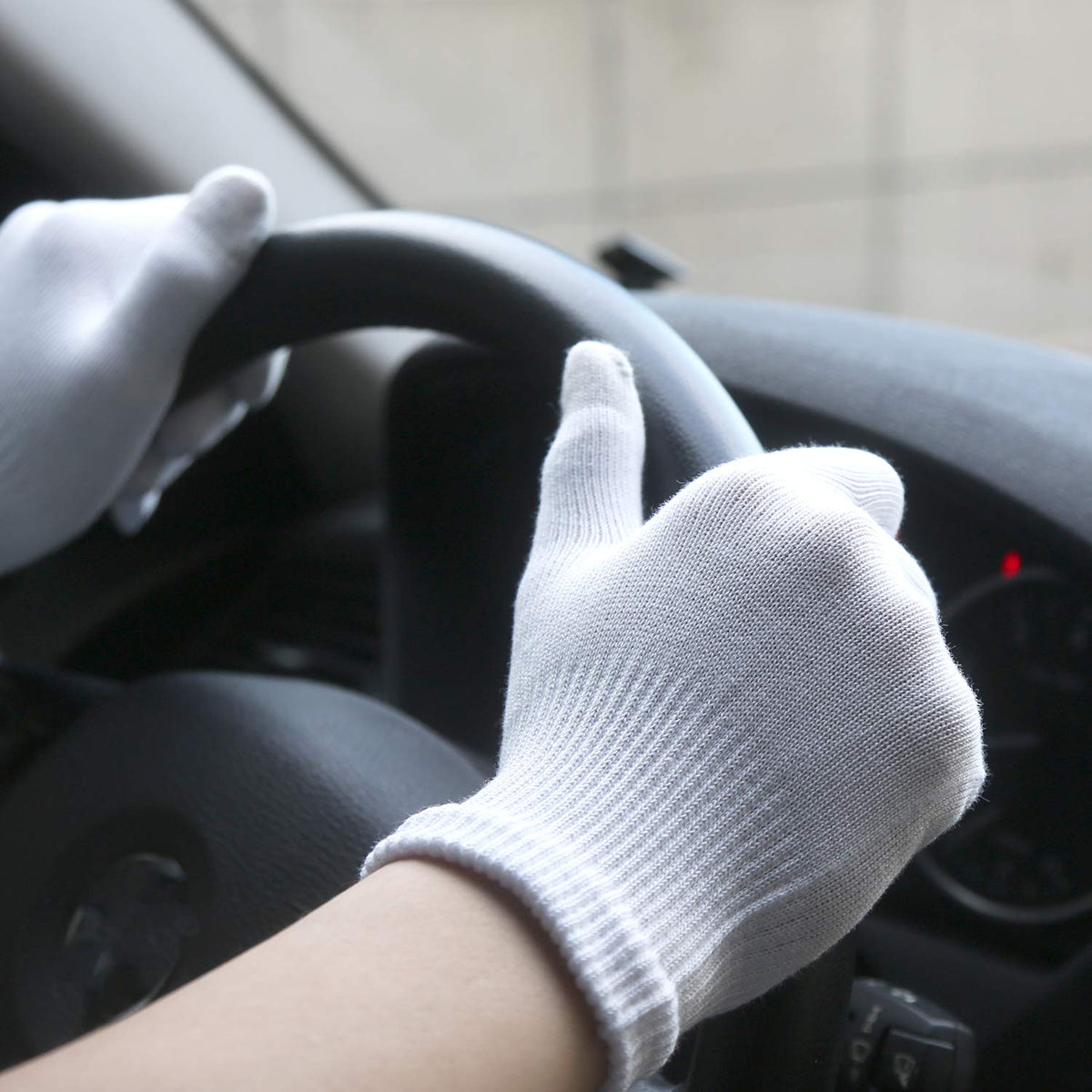 evridwear gloves next to hand showing L/XL scale and coverage