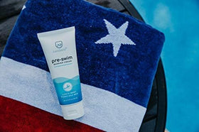 Exershield size comparison beside sunscreen showing portable bottle for swimmers