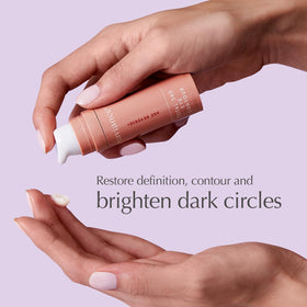 EXUVIANCE model applying eye contour under-eye to reduce puffiness and fine lines