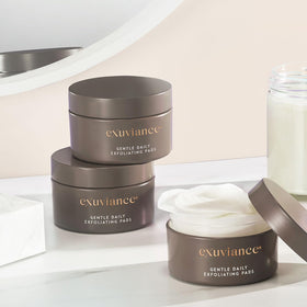 EXUVIANCE ingredient bottles of vitamin C and E supporting radiance