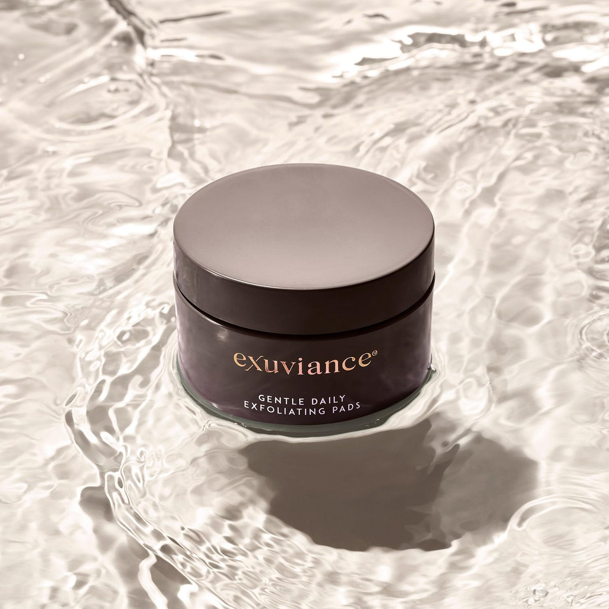 EXUVIANCE open tub with stacked pads indicating quantity