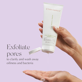 EXUVIANCE label closeup highlighting acid blend and soap‑free formula
