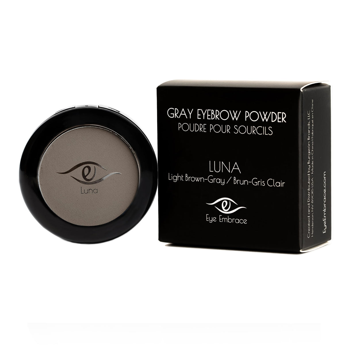 Open compact with Eye Embrace shade swatches showing blendability benefit