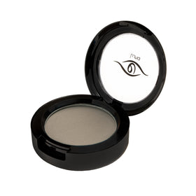 Applying Eye Embrace powder into hairline to conceal roots and add volume