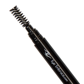 Eye Embrace pencil in hand to show size and travel-friendly portability