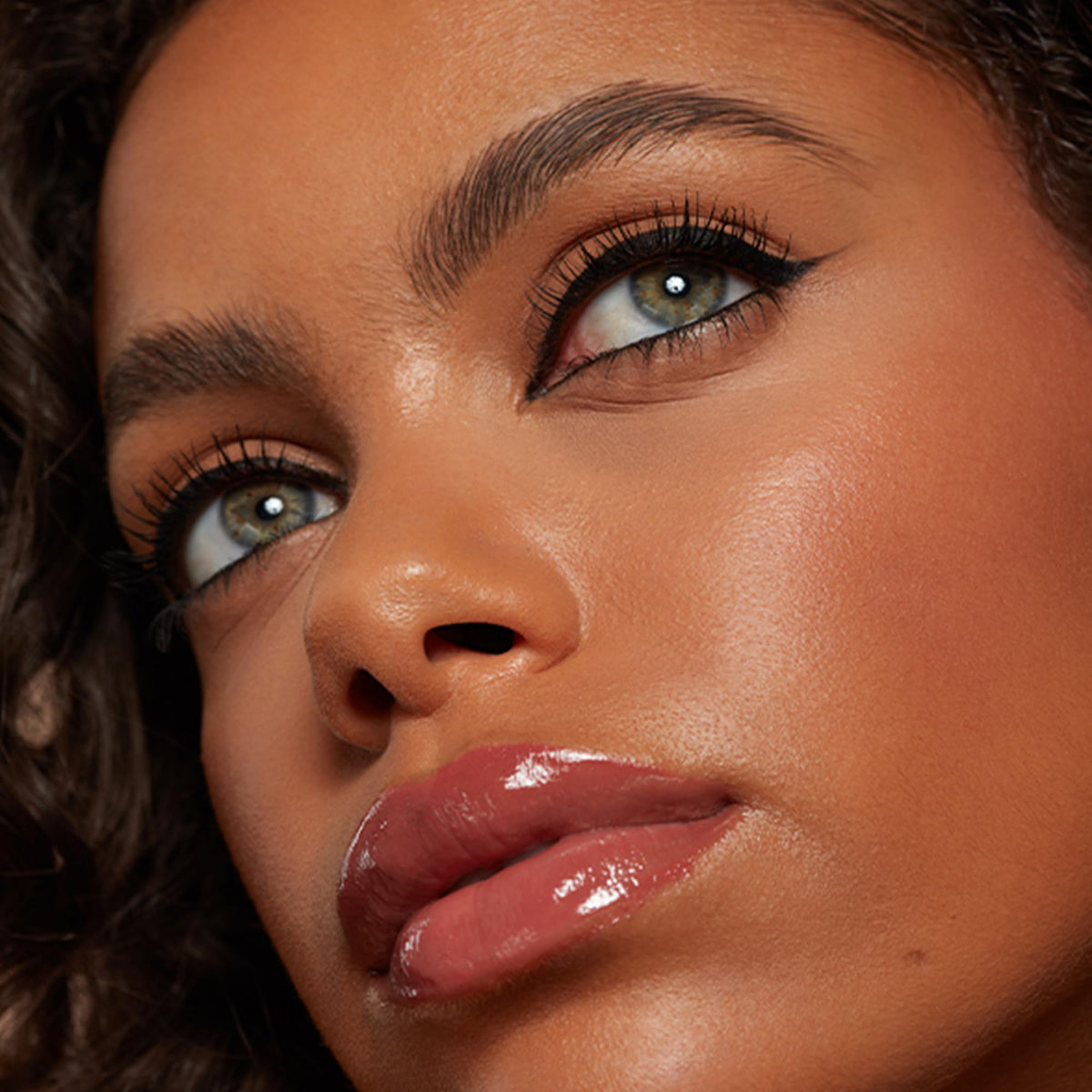 Eyeko carbon black single stroke on white, shows intense pigment benefit