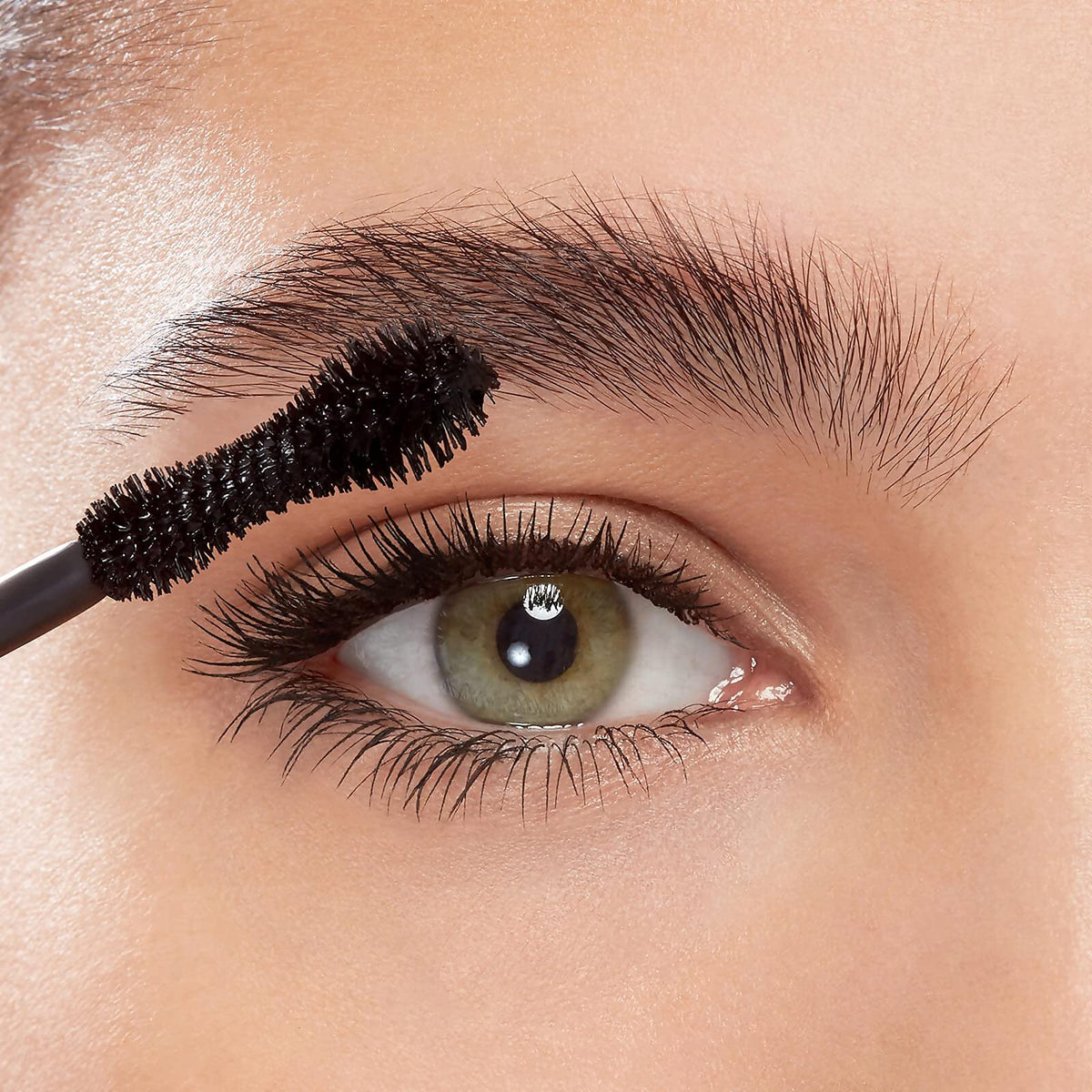 Eyeko mascara applied on eye demonstrating lifted curled lashes