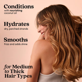 Fable & Mane creamy conditioner texture showing rich hydration and smoothness