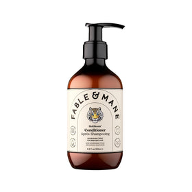 Fable & Mane front bottle view showing product and benefit of hydrating hair