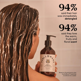 Fable & Mane applied in hand demonstrating spreadability and detangling benefit