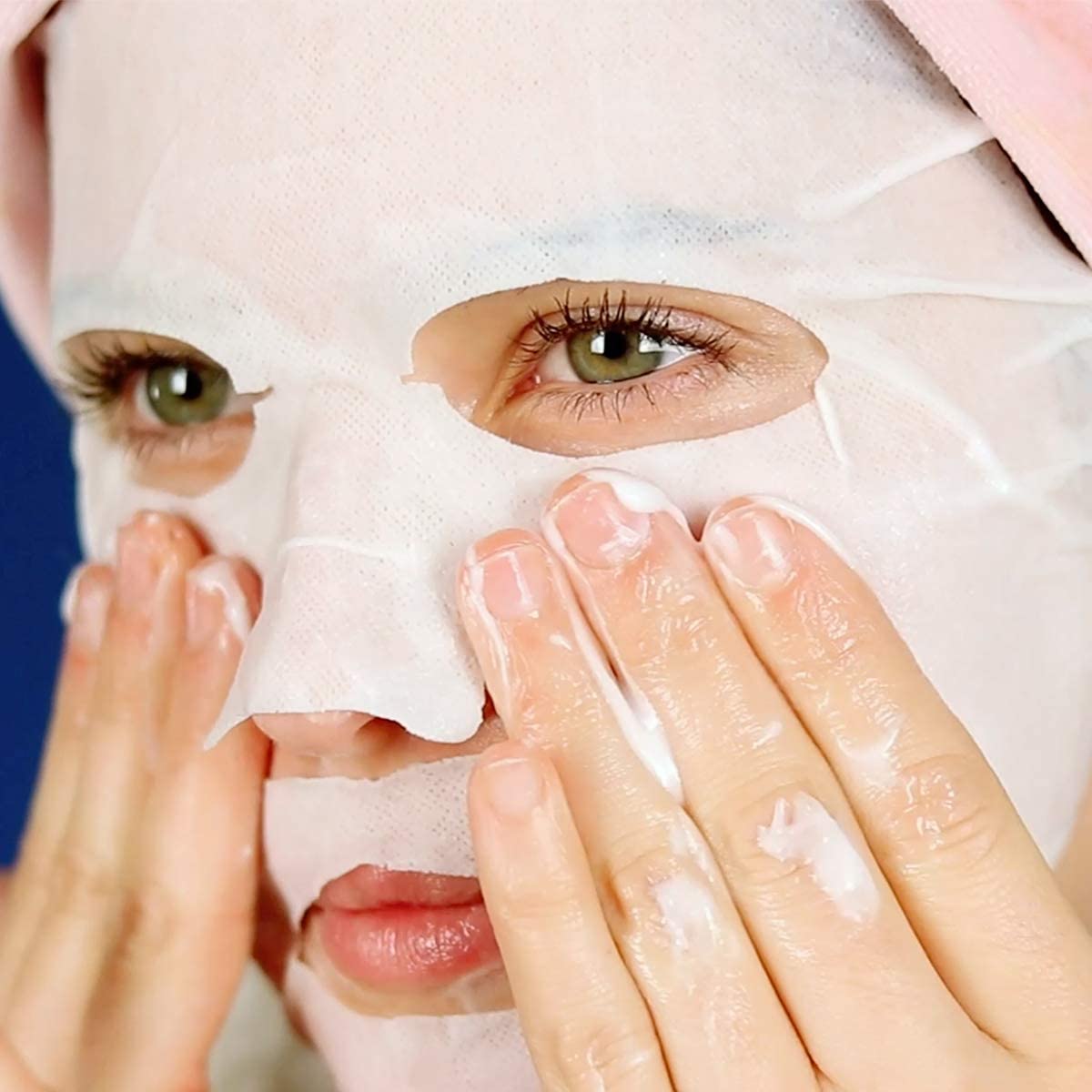 FACETORY mask held in hand indicating compact size and easy use