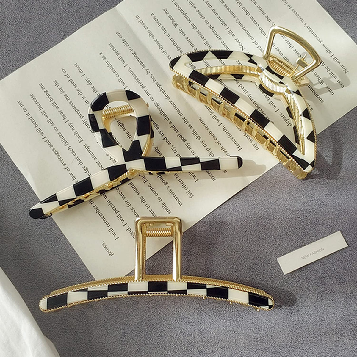 FAELBATY acetate close-up highlighting checker texture and elegant finish