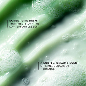 Farmacy balm melting in hands to show makeup-dissolving action