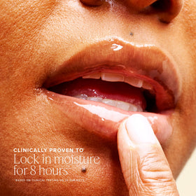 Farmacy applying balm to lips for instant hydration and shine