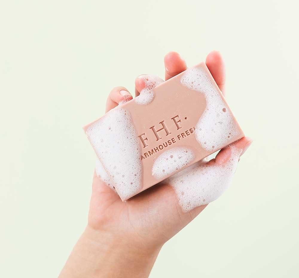 FarmHouse Fresh creamy white lather on palm, rich cushion for soft shaving and cleansing