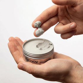 Fatboy Hair paste texture in hand demonstrating dry fibers and oil-absorbing benefit