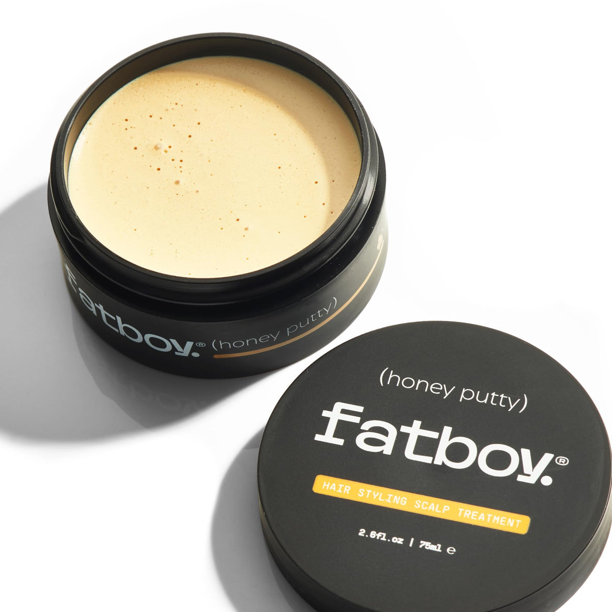 Fatboy Honey Putty open jar showing creamy sheen that indicates light conditioning