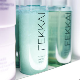 Fekkai prime mist in use during blowdry demonstrating heat protection and frizz control