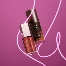 FENTY BEAUTY model wearing Hot Chocolit and oil highlighting polished shiny finish