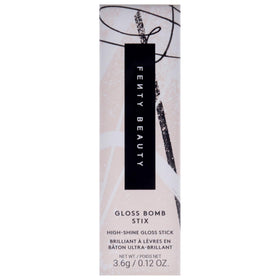 FENTY BEAUTY Gloss Bomb Stix inside a purse illustrating on-the-go touch-up practicality