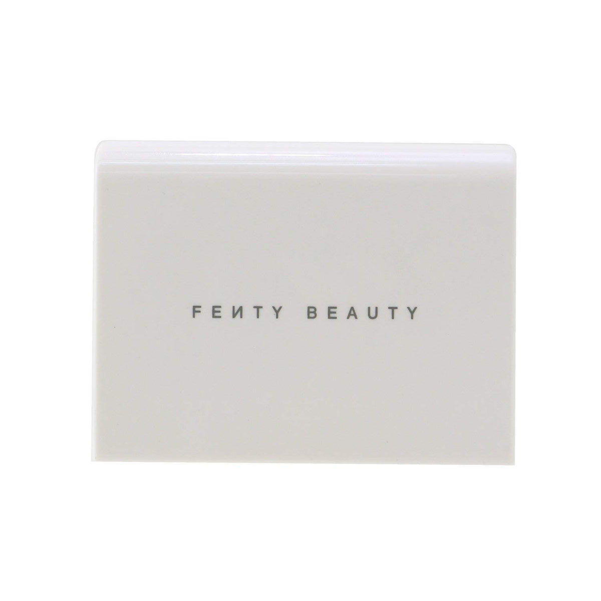 FENTY BEAUTY Invisimatte compact held in hand for size, perfect for touch-ups