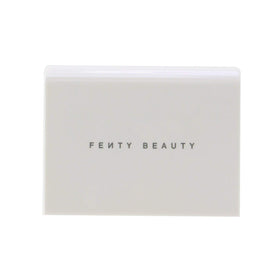 FENTY BEAUTY Invisimatte compact held in hand for size, perfect for touch-ups