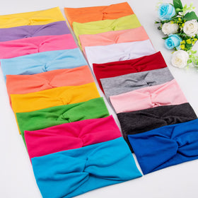FEQO flatlay of 18 colorful headbands showing mix-and-match options