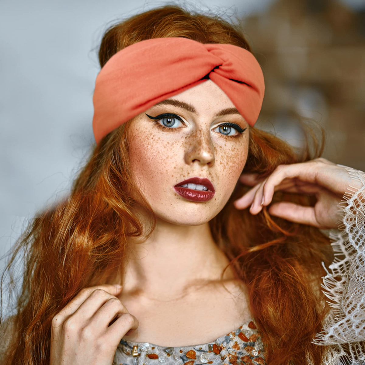 FEQO headband in hand to show size and stretchy scale for most head circumferences