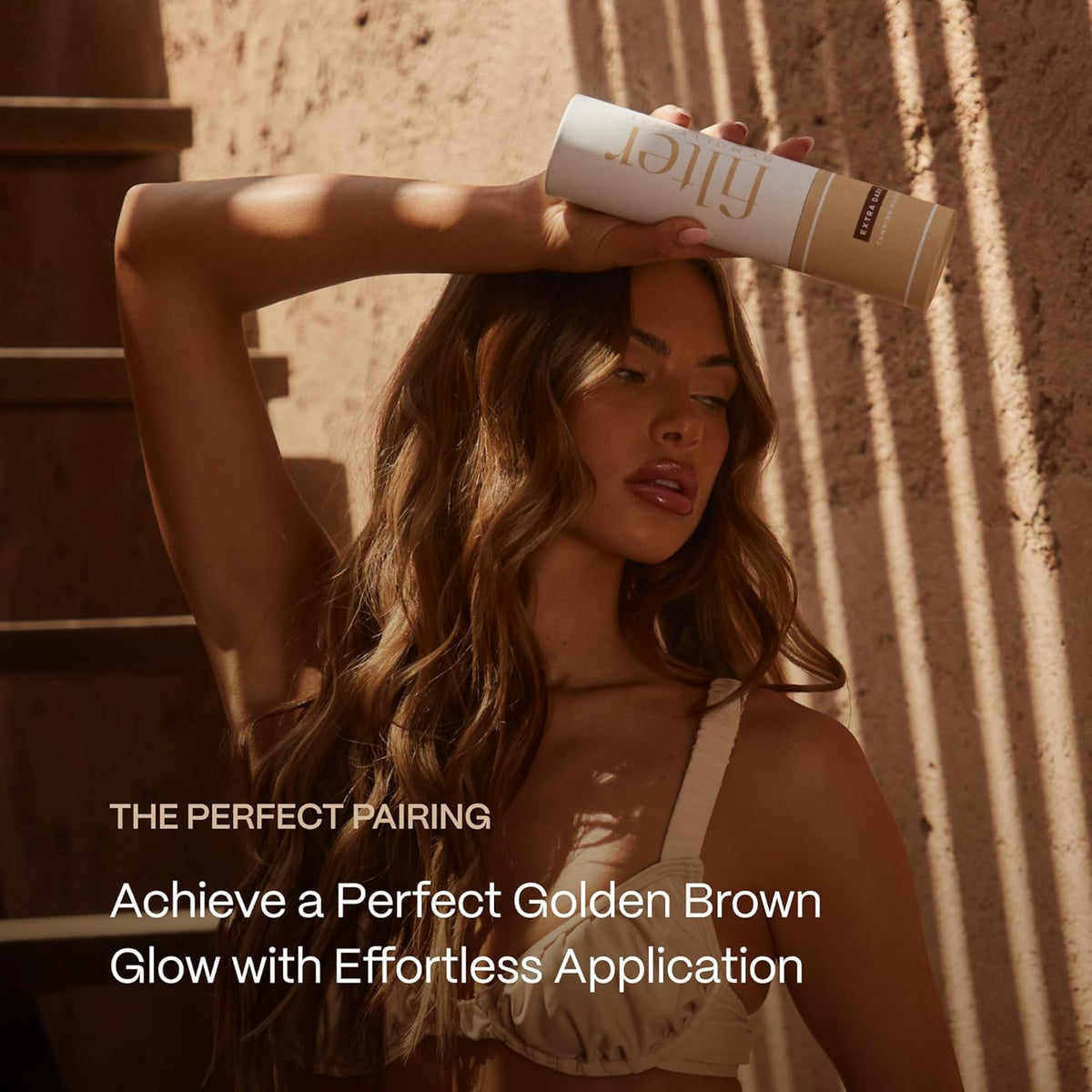 Filter By Molly-Mae lifestyle image at beach highlighting natural golden glow and confident look