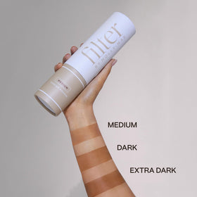 Filter By Molly-Mae bottle in hand to show 6.7oz scale and portable, travel-friendly convenience