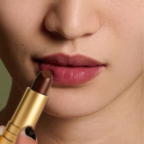 Finding Ferdinand cap open with applicator visible for easy on-the-go use benefit