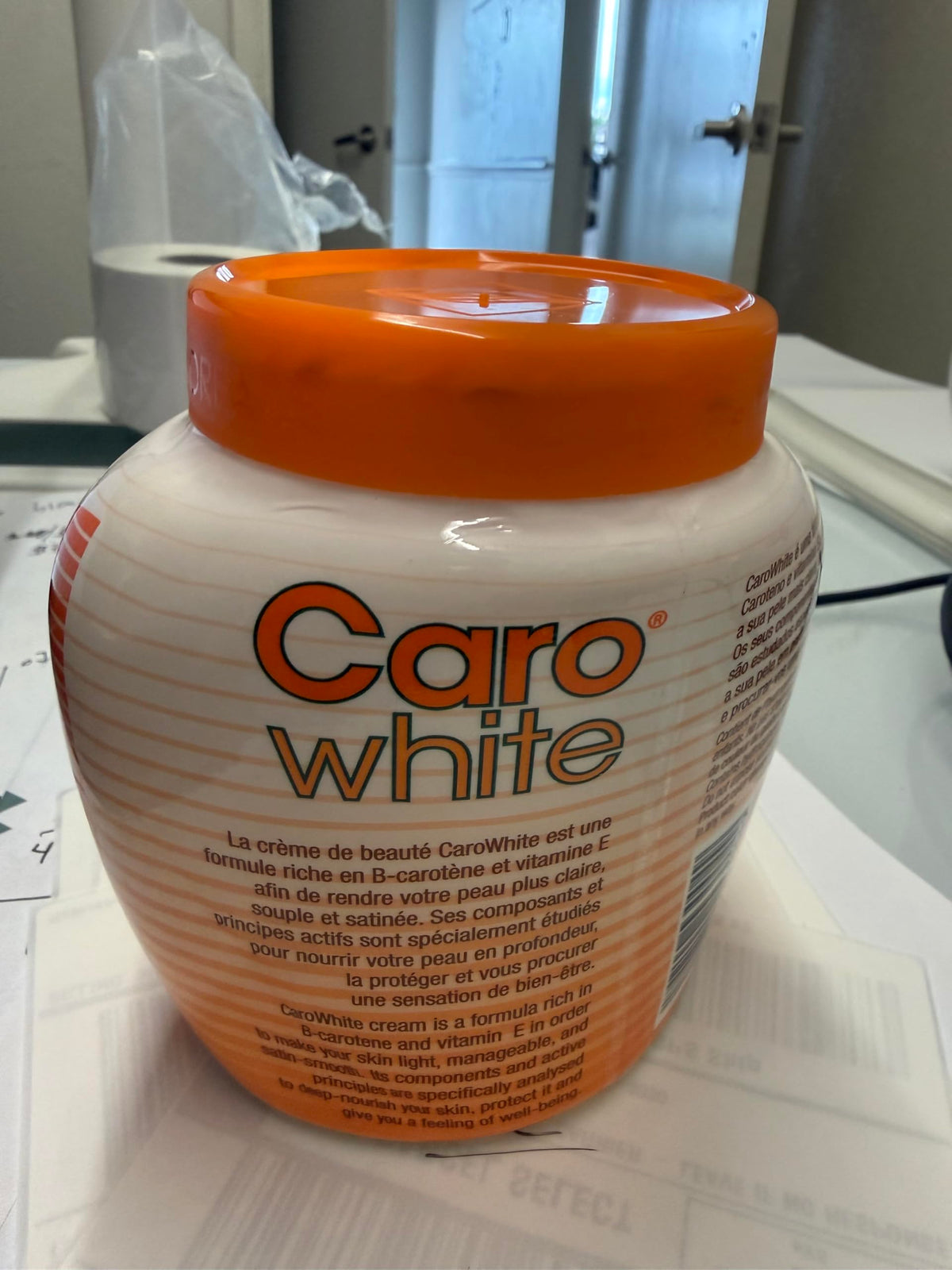 Fine Goods tub next to hand for scale showing the large 500ml size advantage
