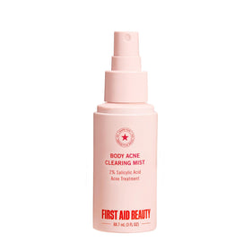 First Aid Beauty front bottle view showing clear acne spray packaging and benefit