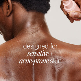 First Aid Beauty bottle inside gym bag showing on-the-go acne care benefit
